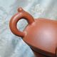 Yixing teapot in signed red clay
