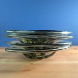 4 wavy glass bowls plates in smoky green design, signed and numbered