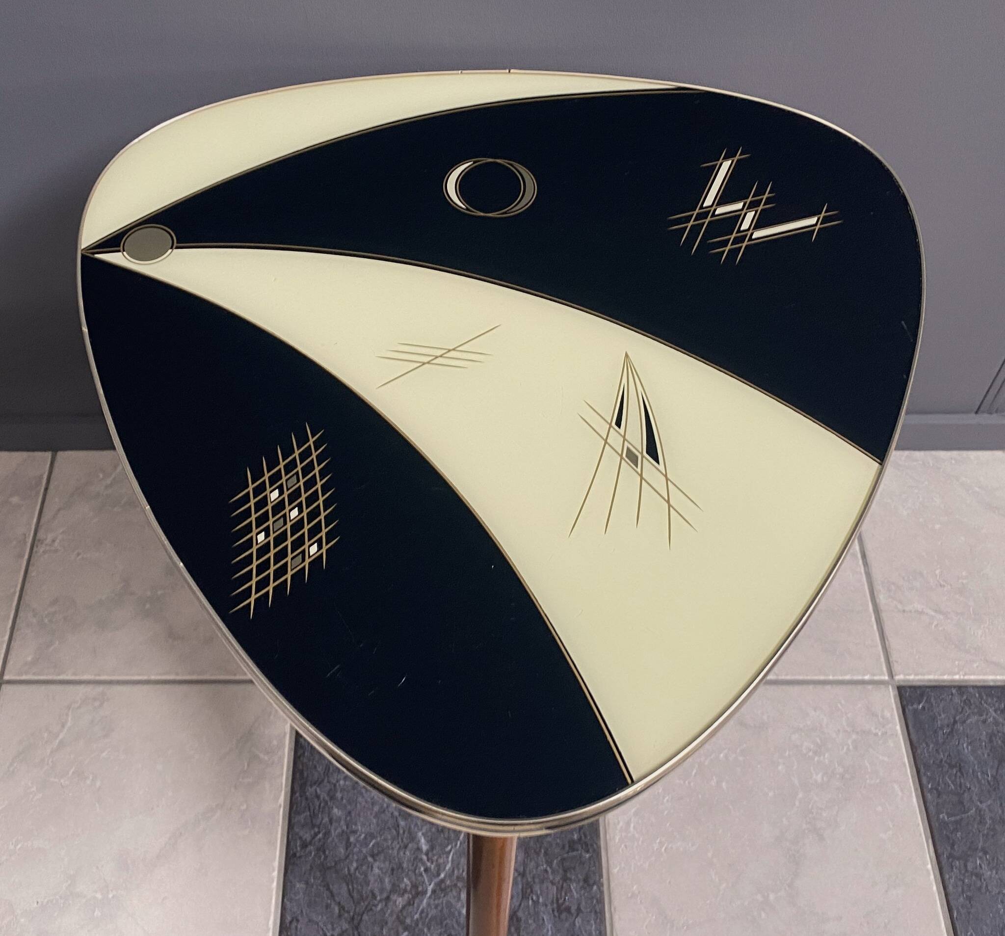 Triangular glass table from the 1960s