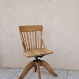 Swivel office chair in blond oak circa 1930