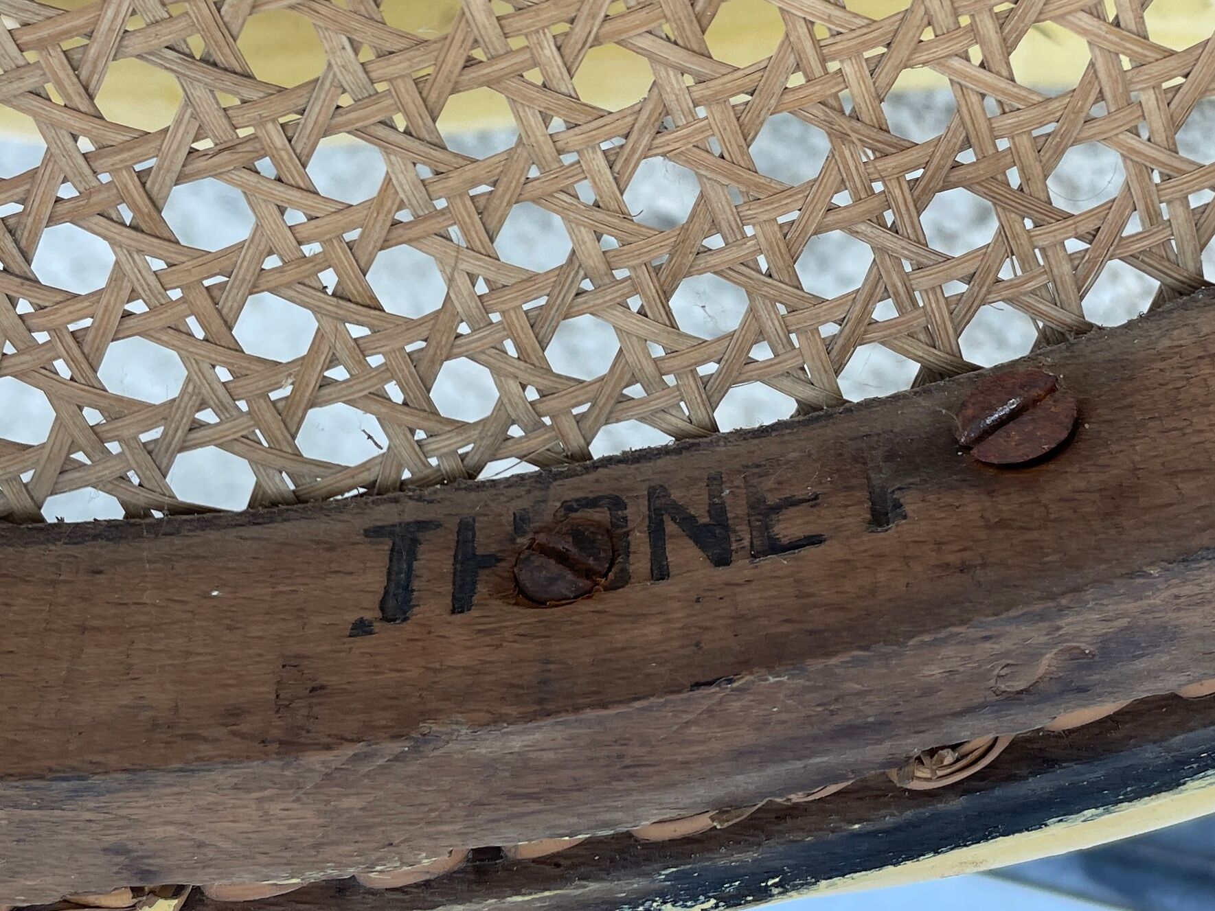 Old armchair Thonet canned wood