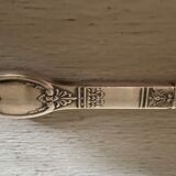 Old silver metal paper cutter