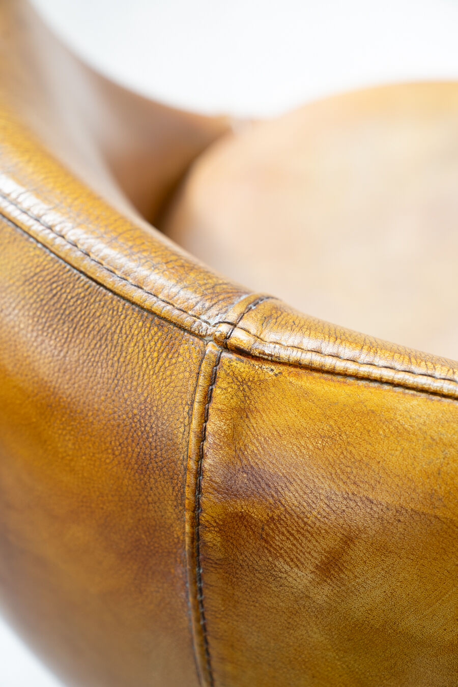 Leather swivel armchairs, early twenty-first century, set of 2