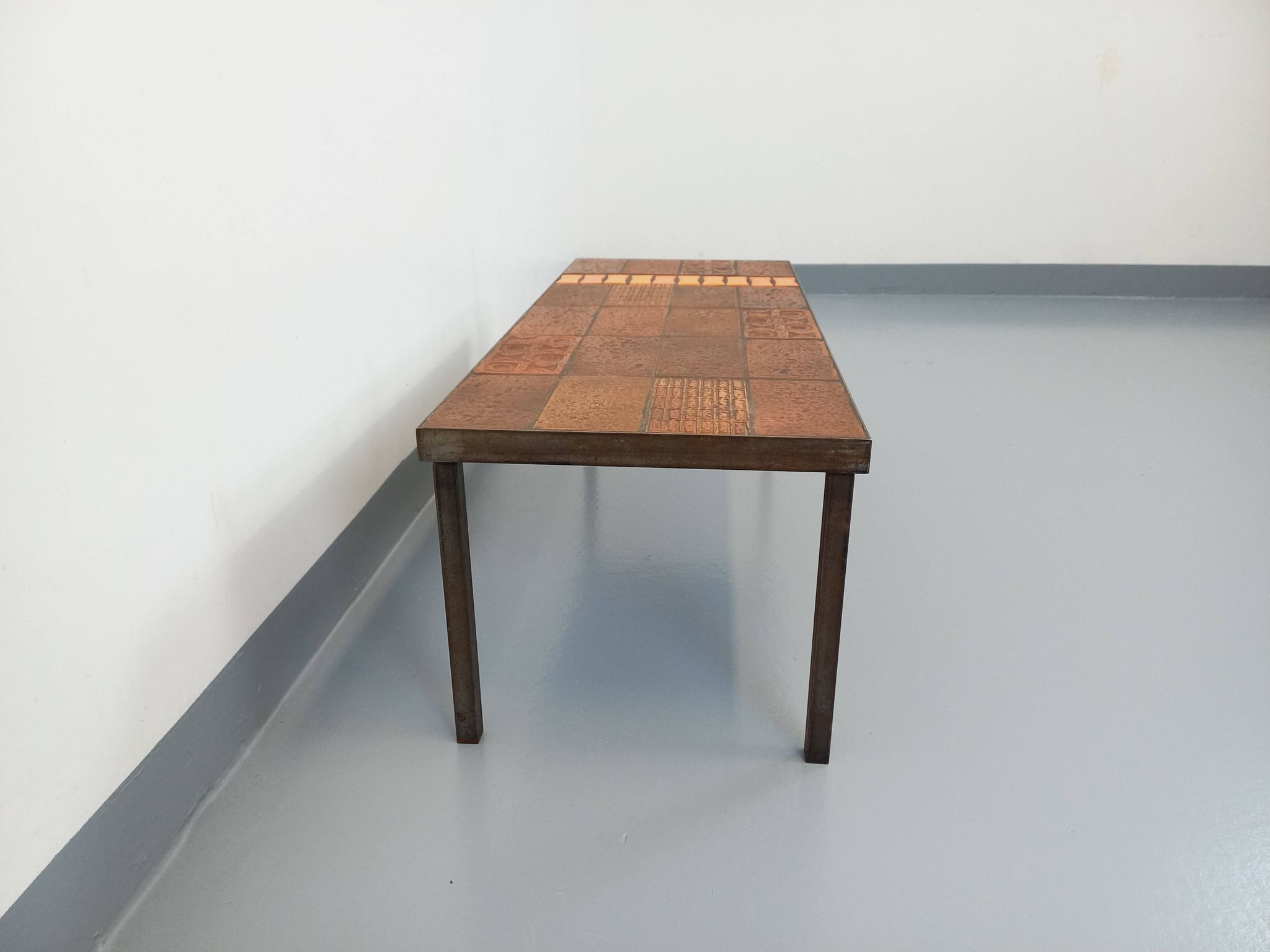 Vintage rectangular coffee table by Jean Jaffeux in steel and ceramic from the 60s