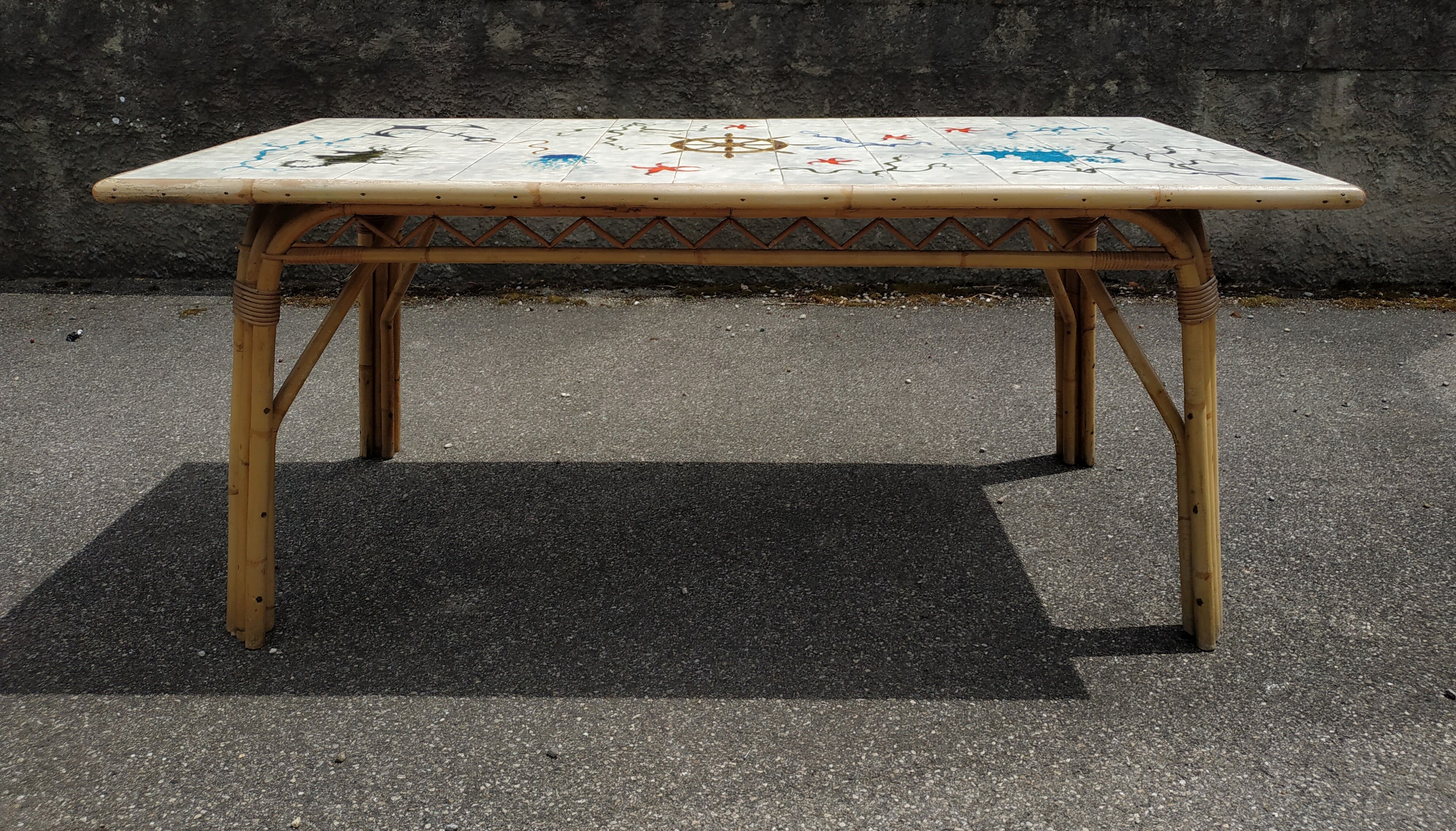 Vintage table in rattan Audoux and Minnet and ceramics Chassin 1950