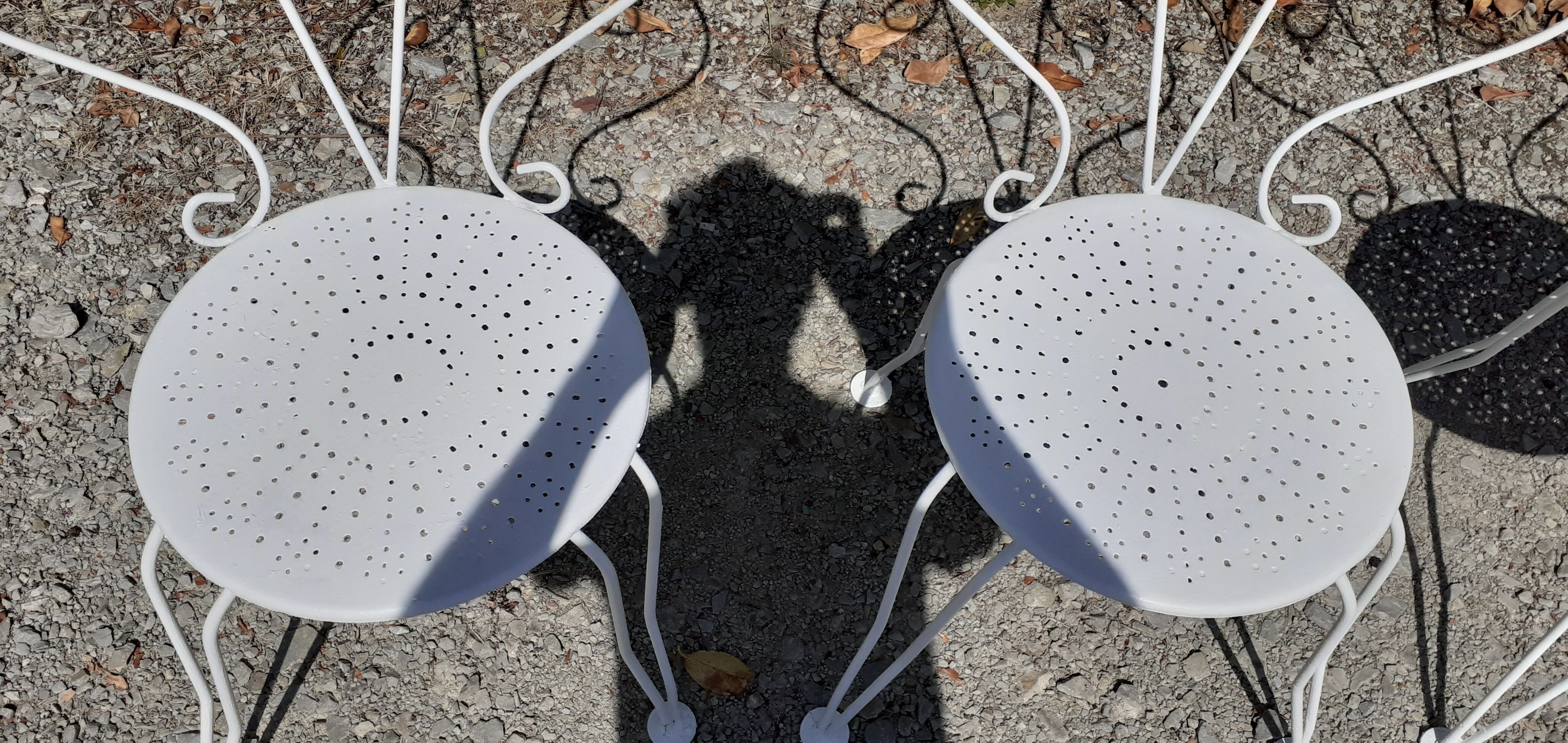 Old white wrought iron garden set