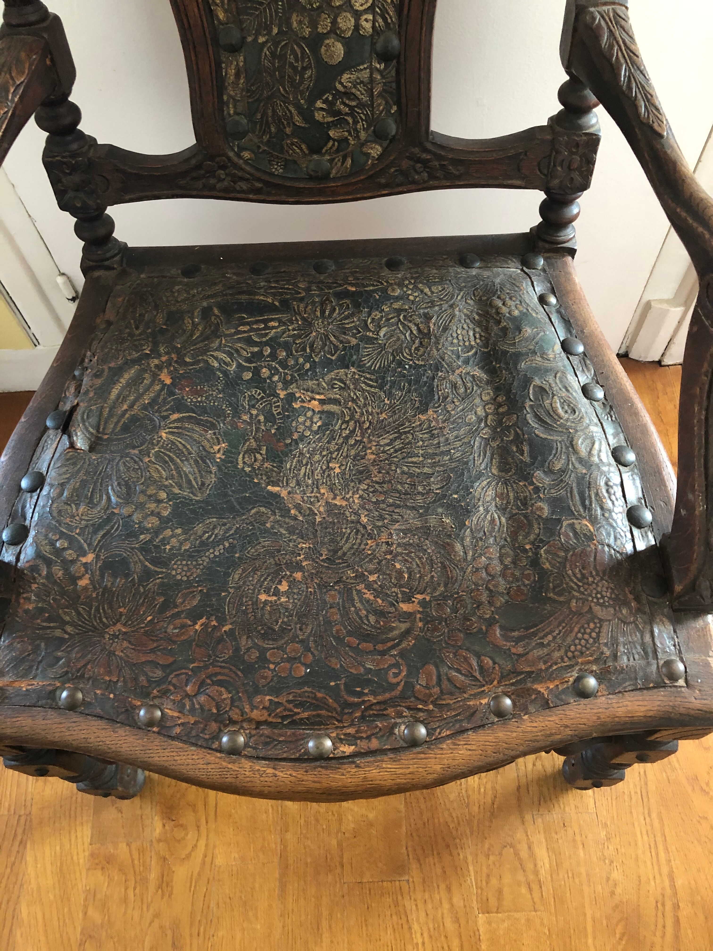 Old carved wooden armchair