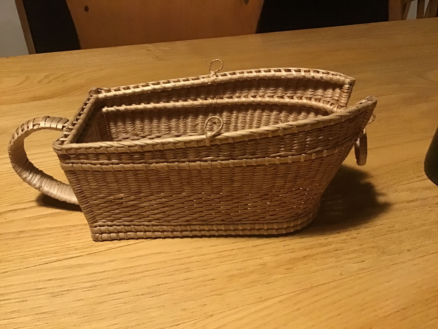 Old wicker bottle holder