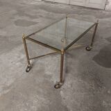 Rolling coffee table in vintage gilded bronze