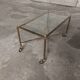 Rolling coffee table in vintage gilded bronze