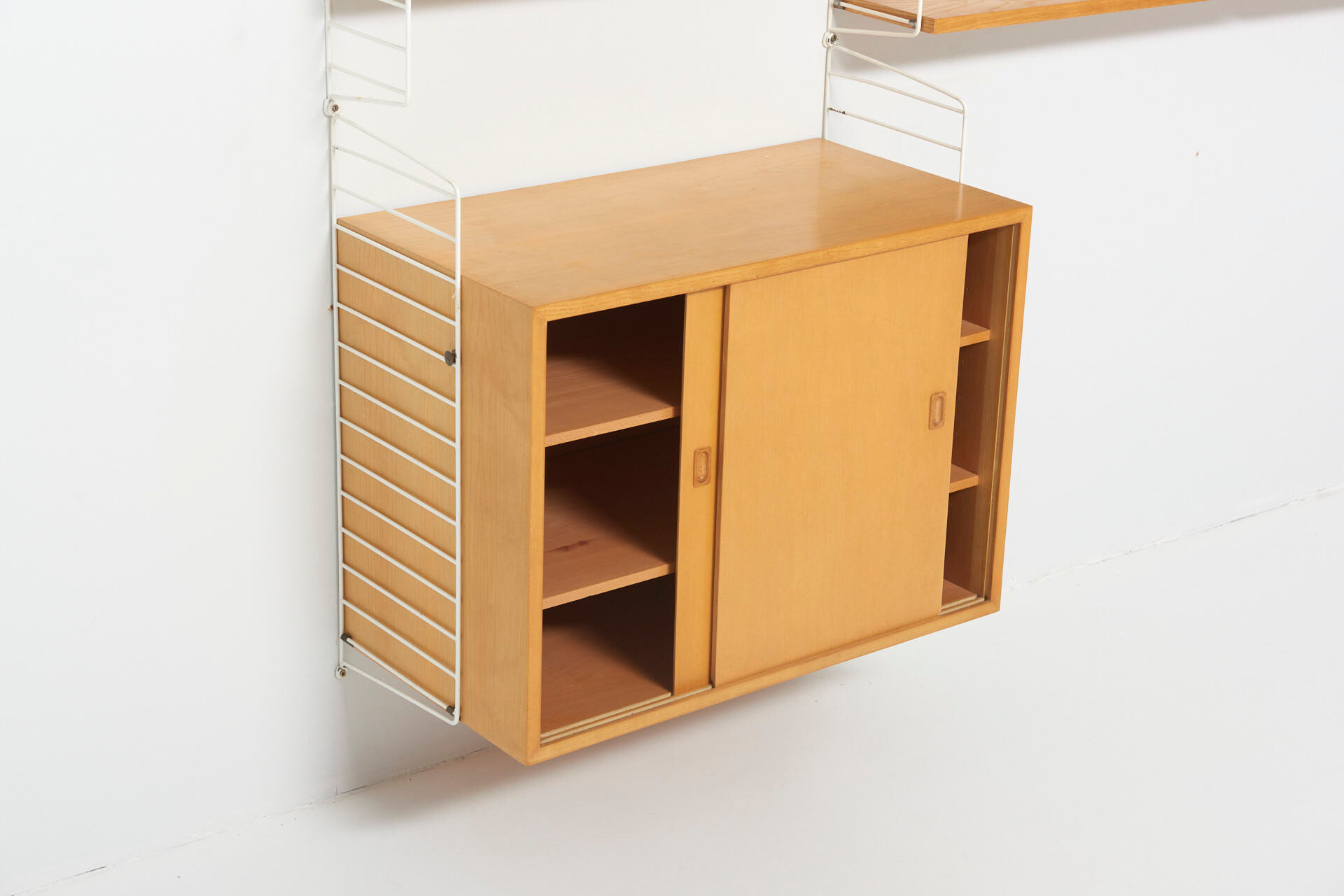 String wall system in ash by Nisse Strinning, Sweden 1950