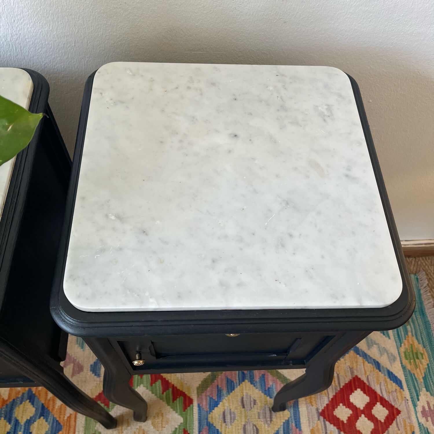 Pair of marble and wood bedside curved feet