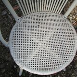 Low armchair in wicker and rattan
