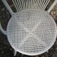Low armchair in wicker and rattan