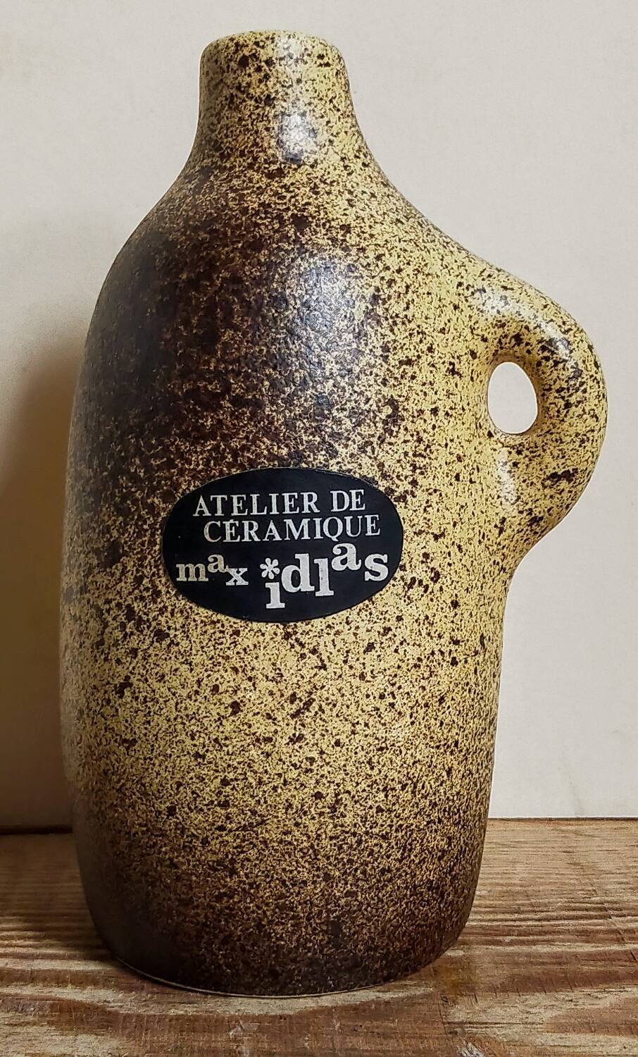 Single-flower vase, ceramic bottle by Max Idlas