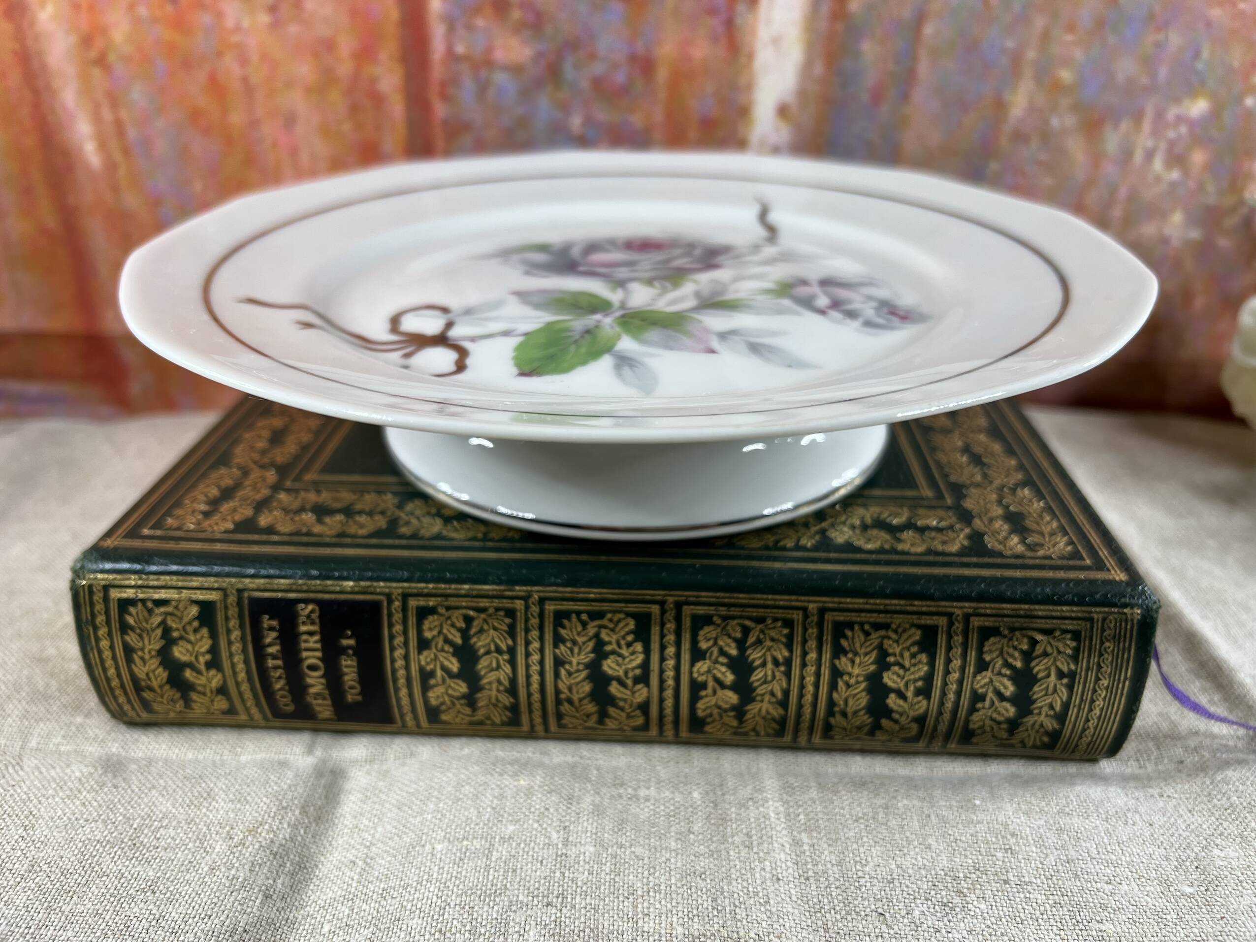 Cup on foot display in Limoges porcelain