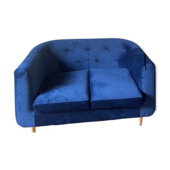 Canapé en velours bleu