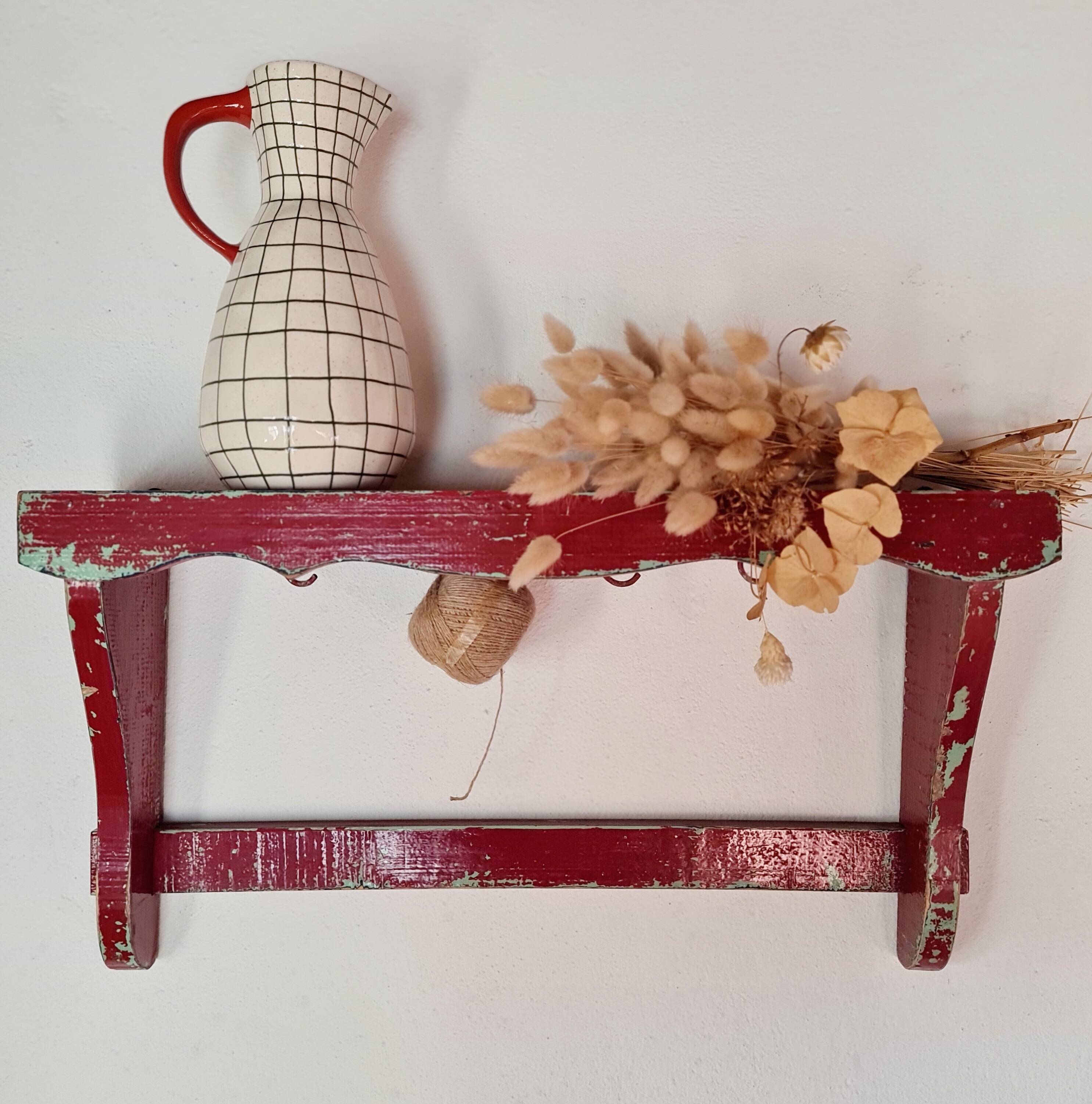 Wall shelf in garnet red wood