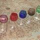 Set of 9 colored port glasses, 5 tulip-shaped and 4 balloons