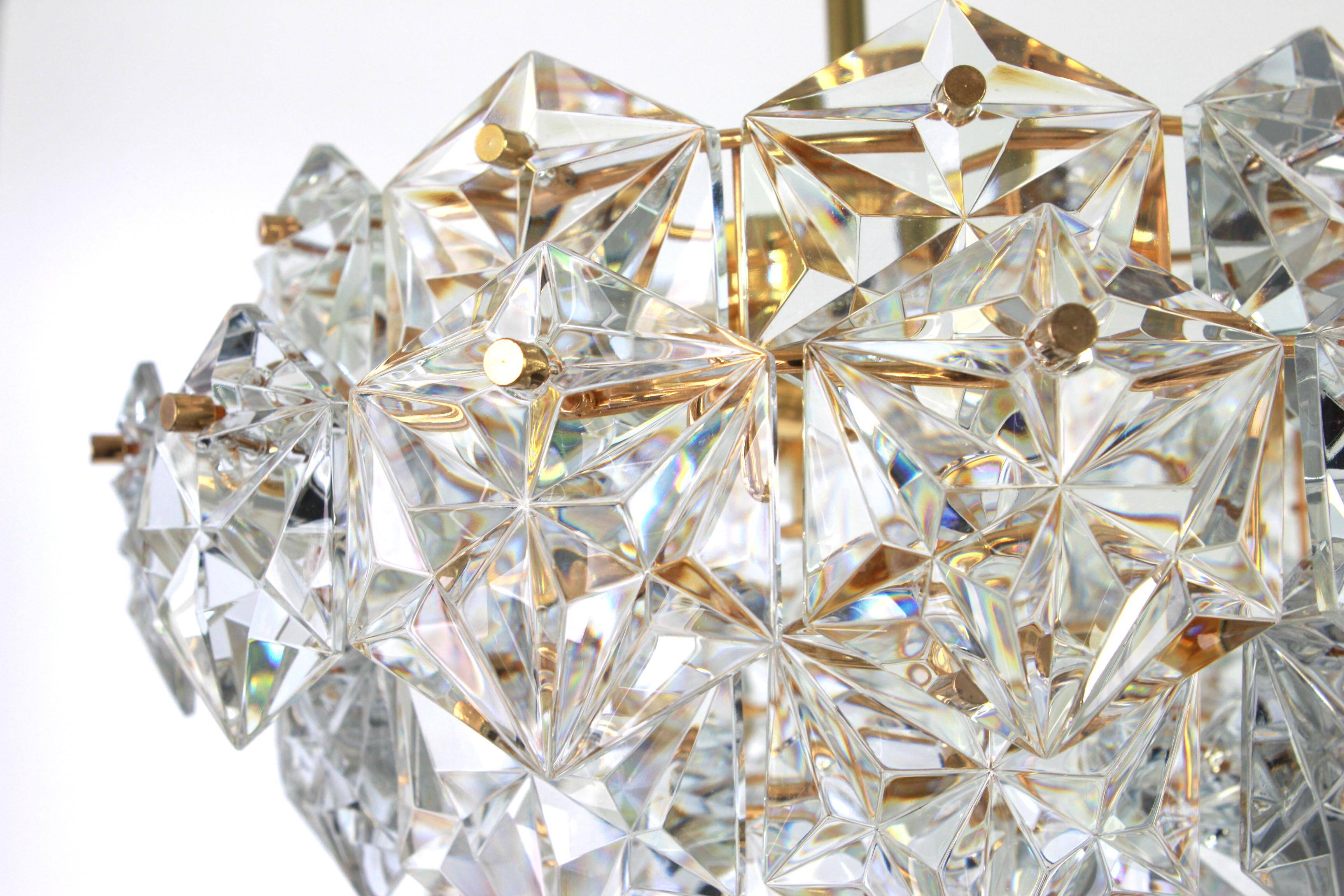 Golden brass and crystal glass chandelier by Kinkeldey, Germany, 1970s.