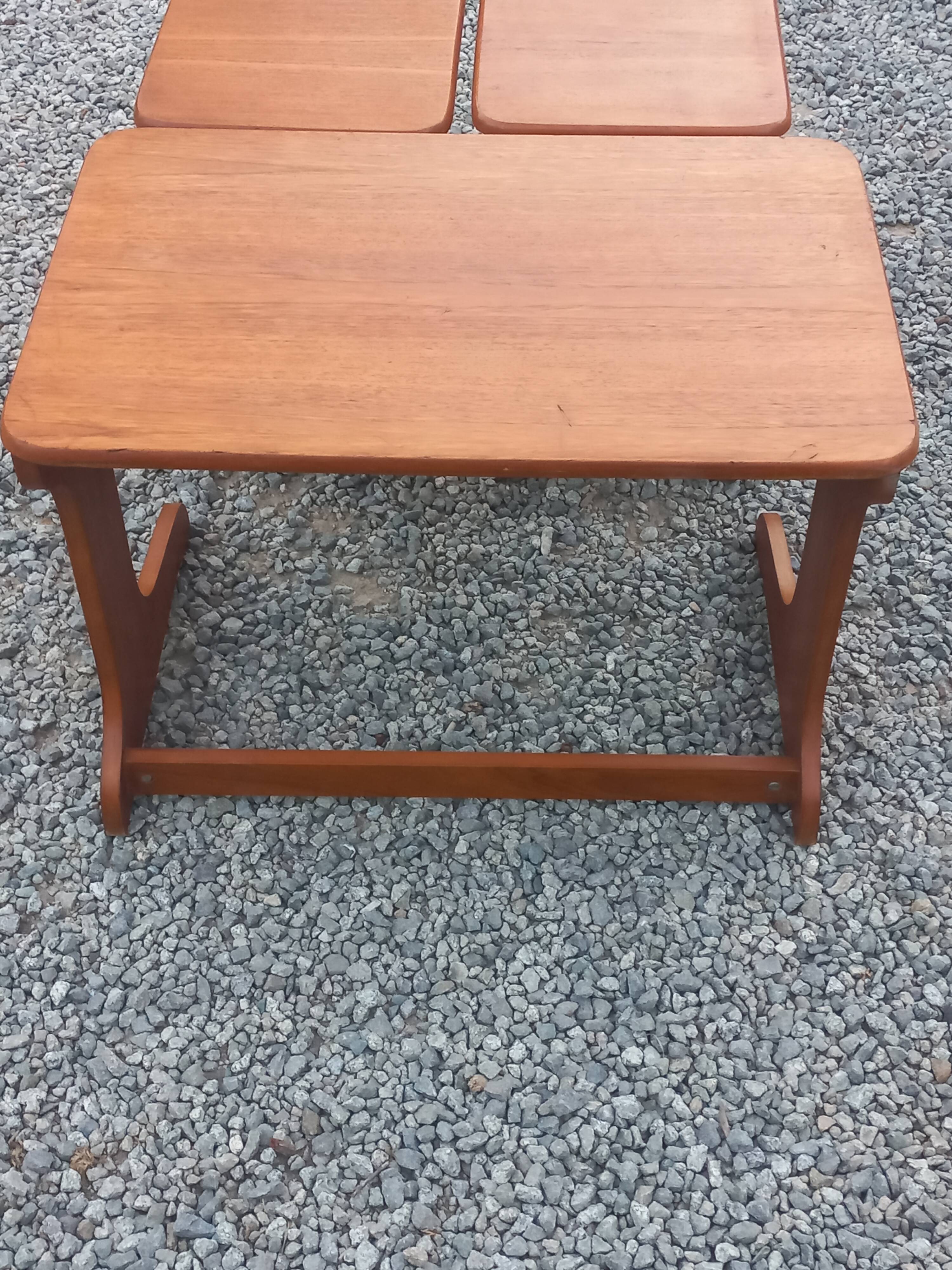 Set of 3 nesting tables in Scandinavian style made of teak from the 1970s.