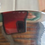 Hollow oval plate in silver metal