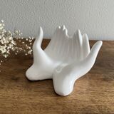 Empty white ceramic hand pocket