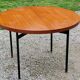 Vintage round table in blond mahogany by Gérard Guermonprez Editor Magnani, metal base