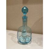 Blue carafe with vintage button