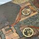 Pair of vintage Kneipp side tables with sculptural tops in mixed materials, 1970s