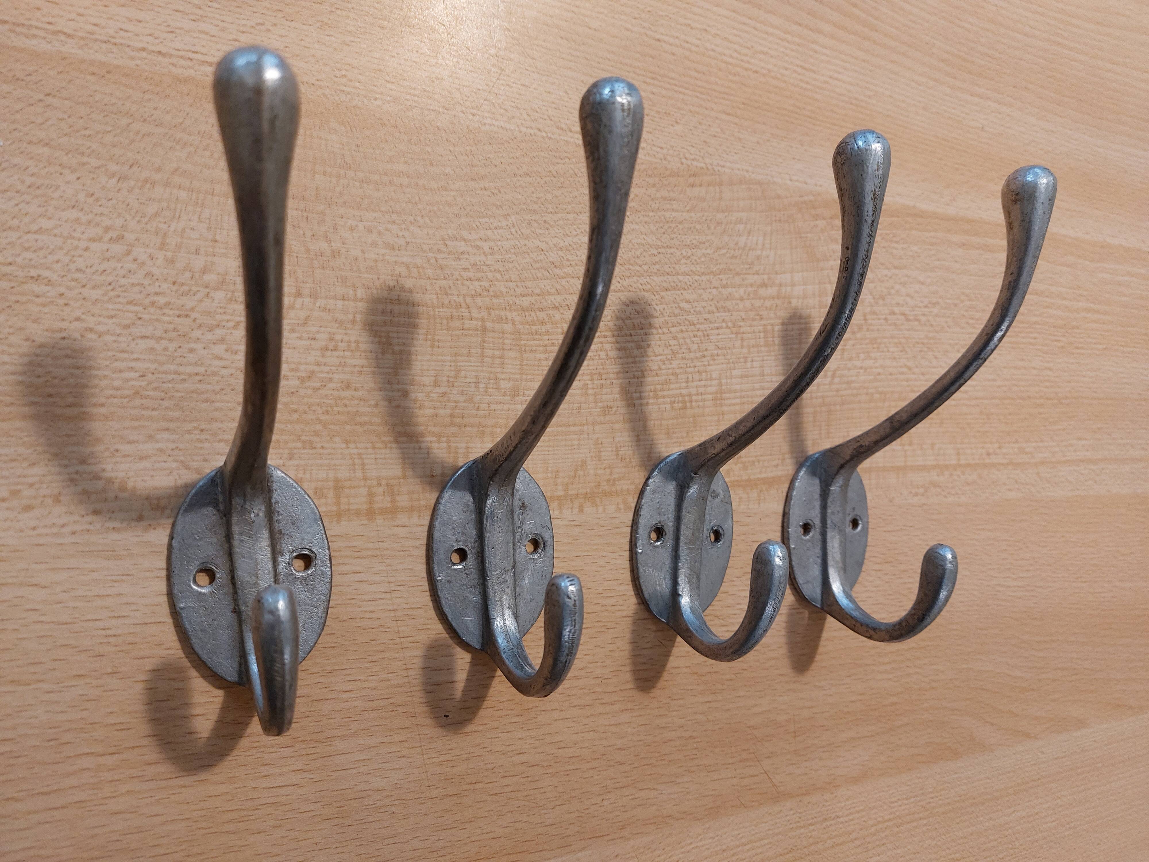4 old aluminum hooks 30s