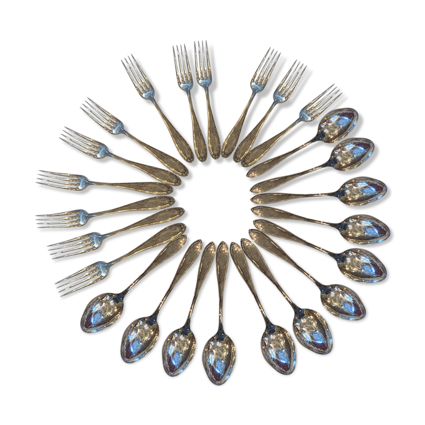 Series of 12 forks and 12 silver metal spoons