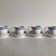 4 coffee cups and saucers