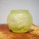 Fluorescent yellow ball vase with vine leaf patterns