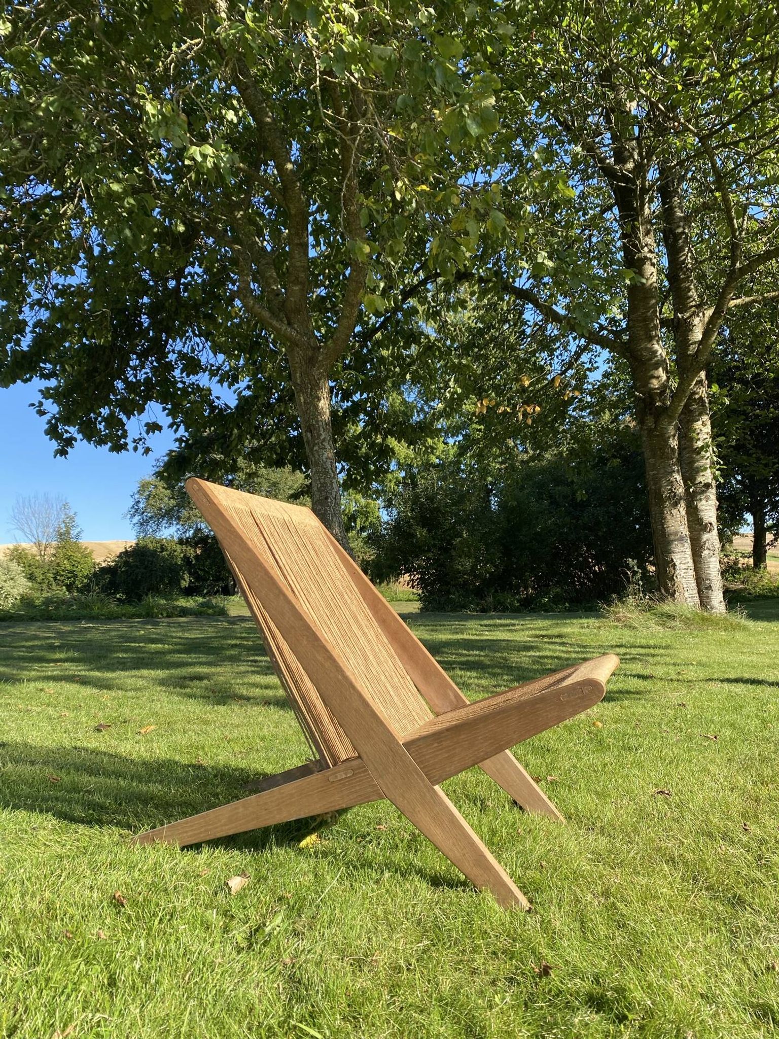 Sculptural lounge chair in oak w/ paper cord