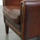 Characterful vintage design armchair made from beautifully patinated sheepskin