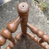 Antique Bobbin armchair with straw seat