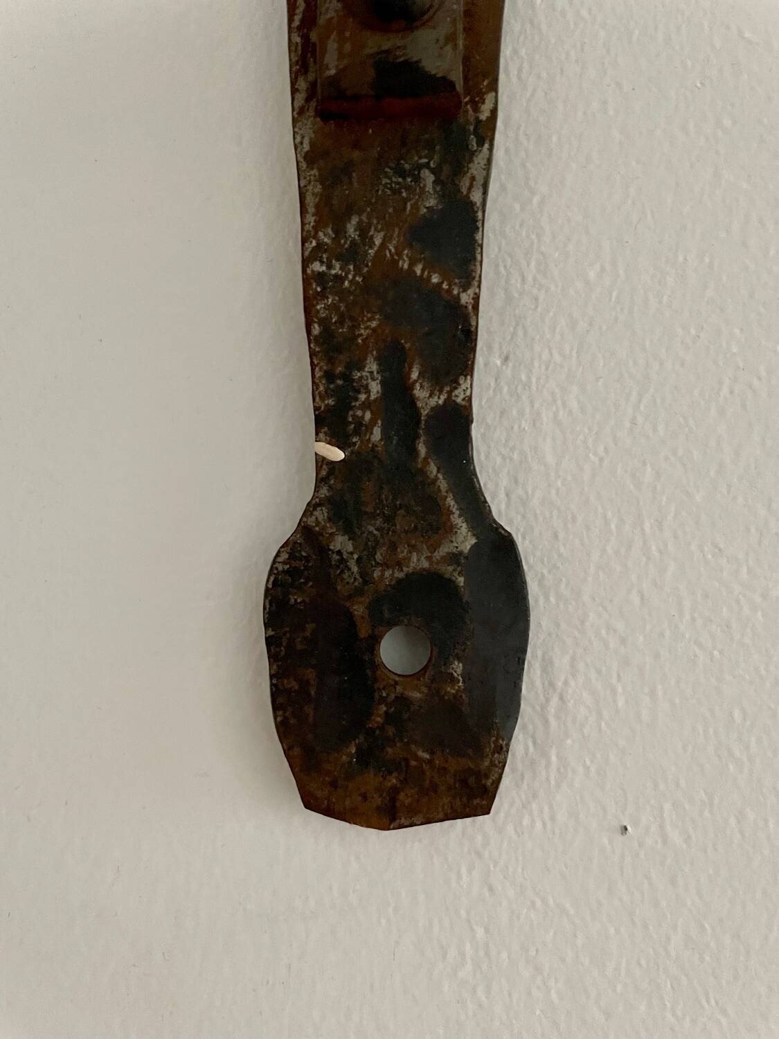 Brutalist wrought iron wall candle holder