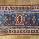 Tapis vintage en laine polychrome