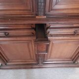 Antique two-part cabinet in solid wood, molded and carved