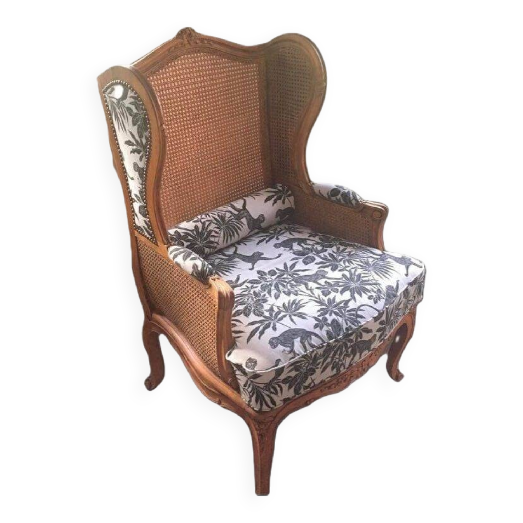 Antique wingback armchair