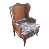 Antique wingback armchair