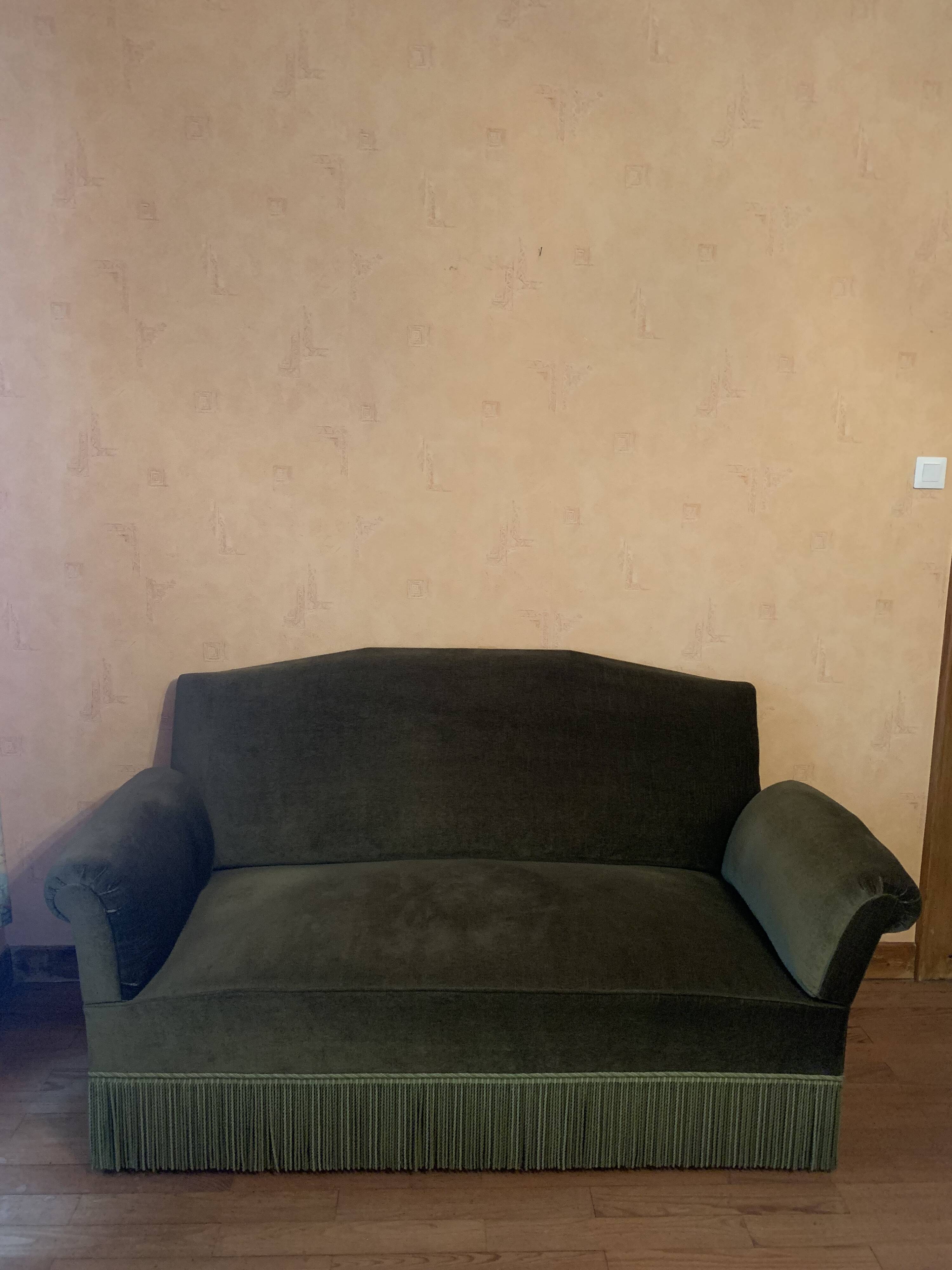 Green velvet bench with fringe