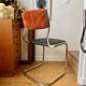 Paire de chaises en nubuck, skaï et aluminium chromé