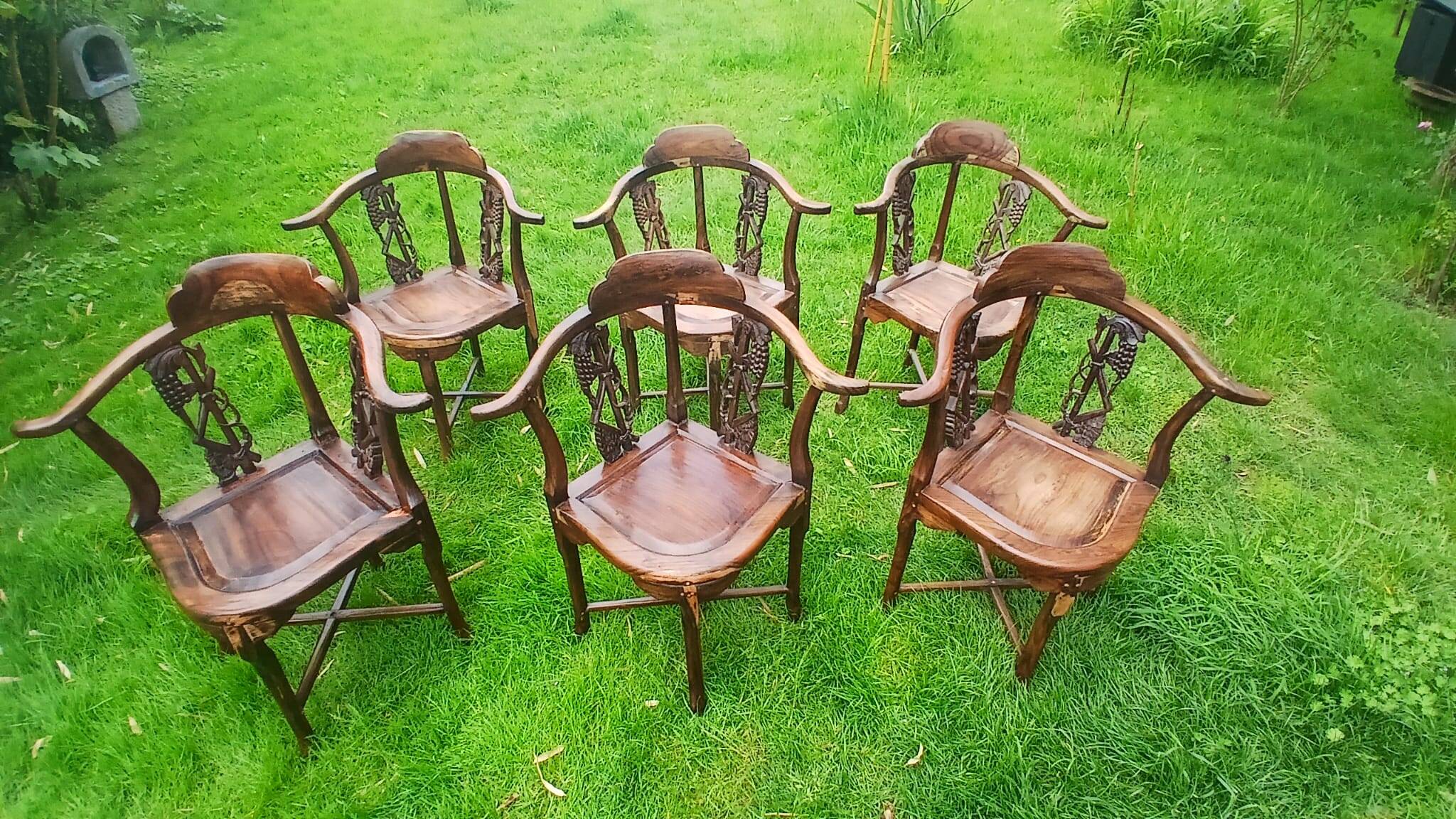 Set of 6 corner chairs in colonial style made of carved exotic wood from Bali.