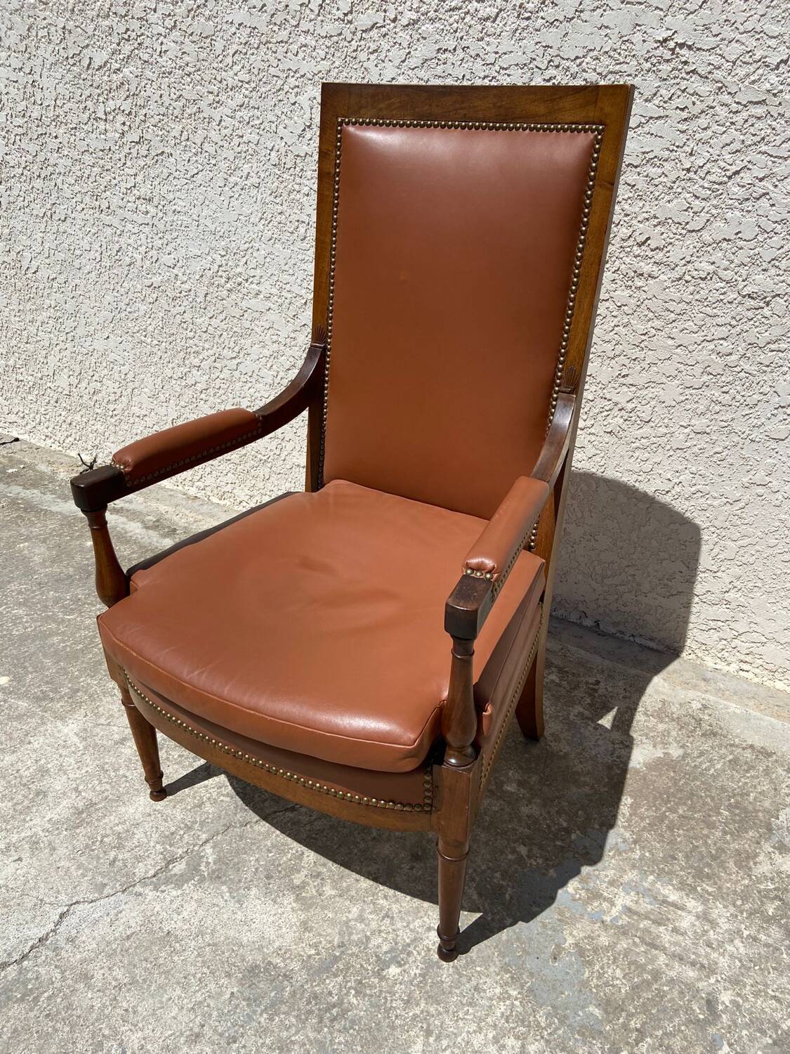 Wooden and leather armchair