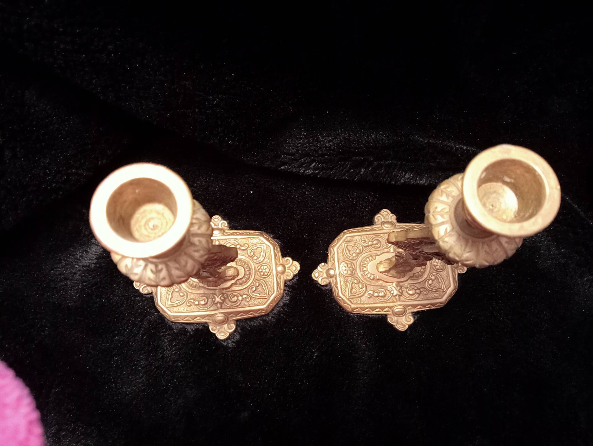 Pair of bronze candle holders decorated with herons