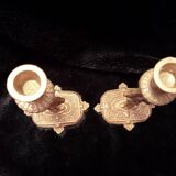 Pair of bronze candle holders decorated with herons