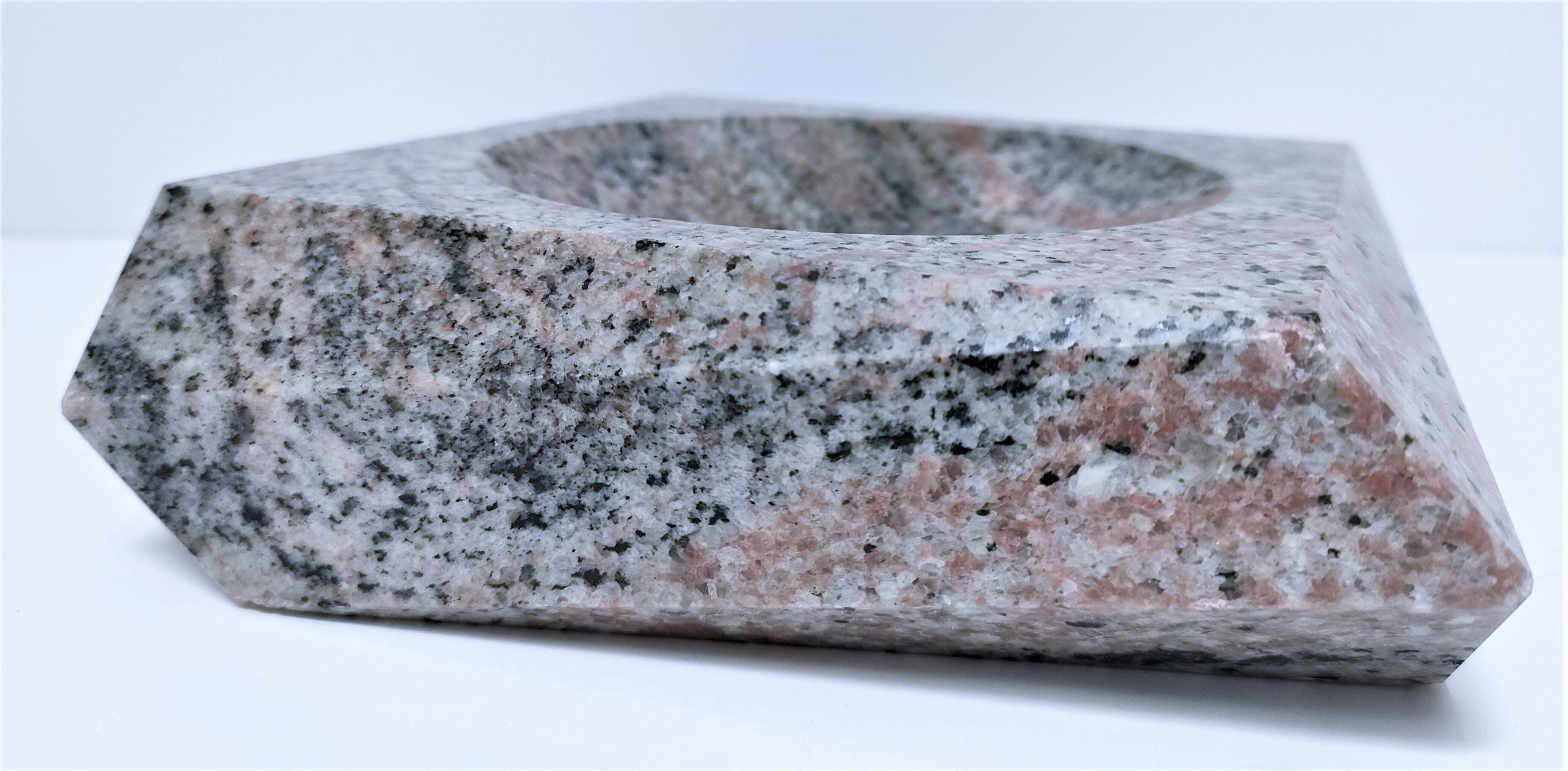 Pink granite pocket emptier from the 80s