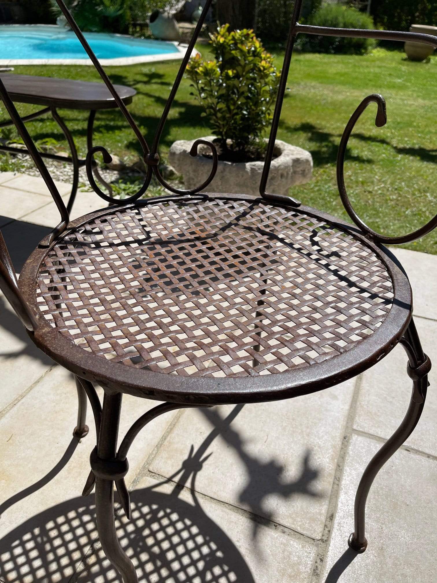 Handcrafted wrought iron garden chair